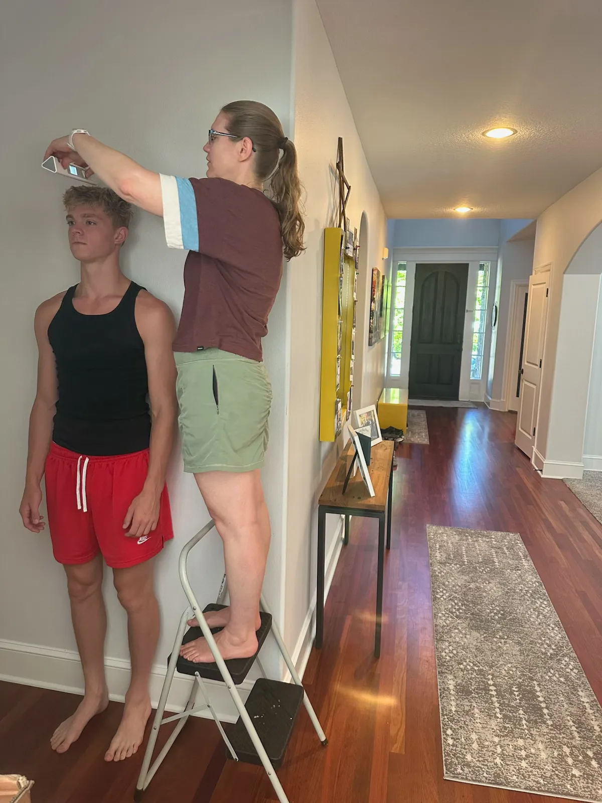 Dr. Rivers measuring a patient